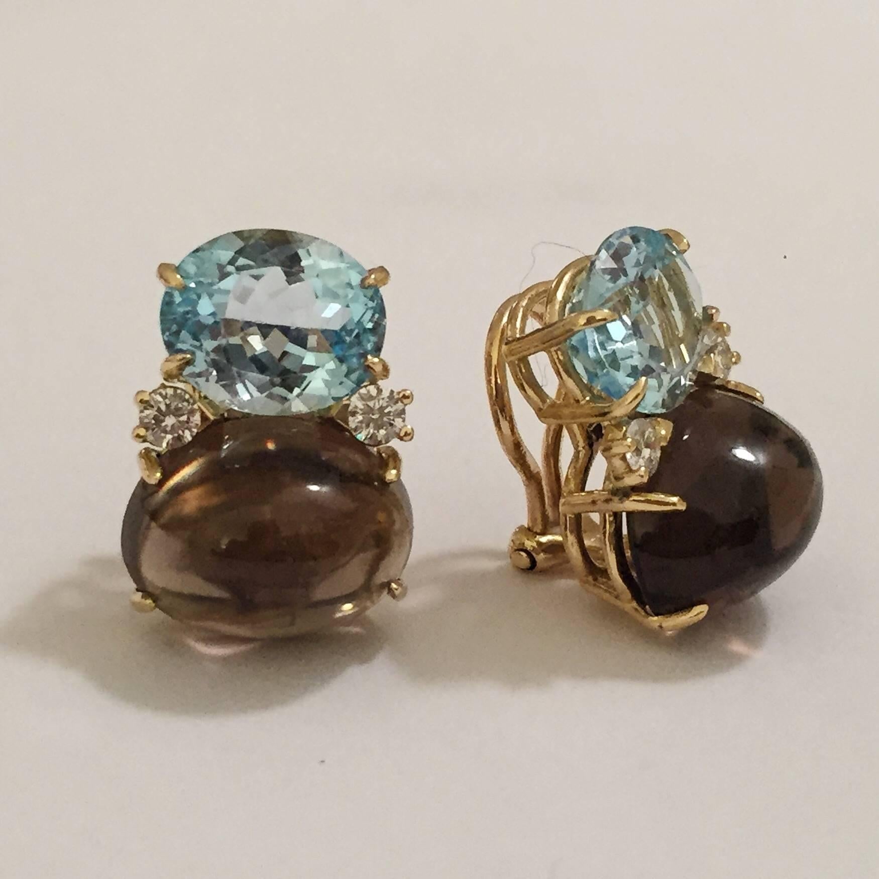 18kt Yellow Gold Large GUM DROP™ Earrings with faceted Blue Topaz and Cabochon Smokey Topaz and diamonds.  

The Blue Topaz is approximately 5 cts each and the Cabochon Smokey Topaz is approximately 12 cts each, and 4 diamonds weighing
