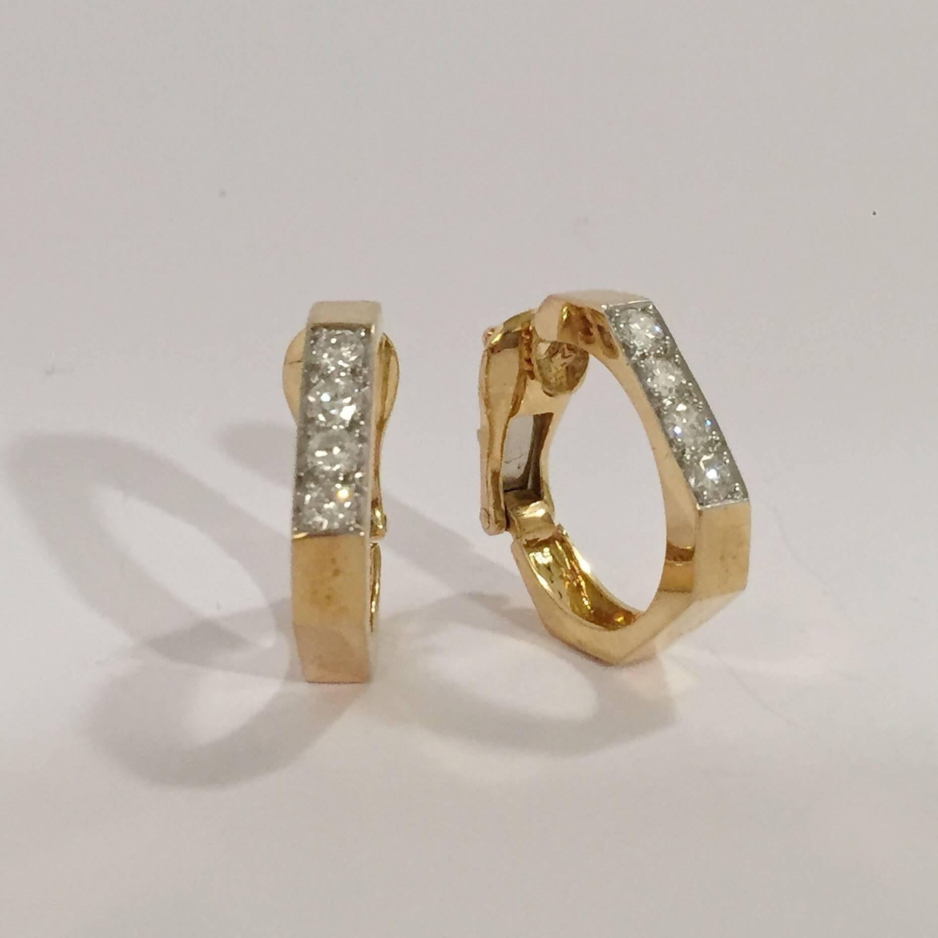 18kt Yellow gold Diamond Hoop angled shape clip earring, David Webb.  The Hoops contain 6 round diamonds weighing approximately  1.00ct.

The hoops are made for clip earrings but can be posted.

The earrings measure  7/8