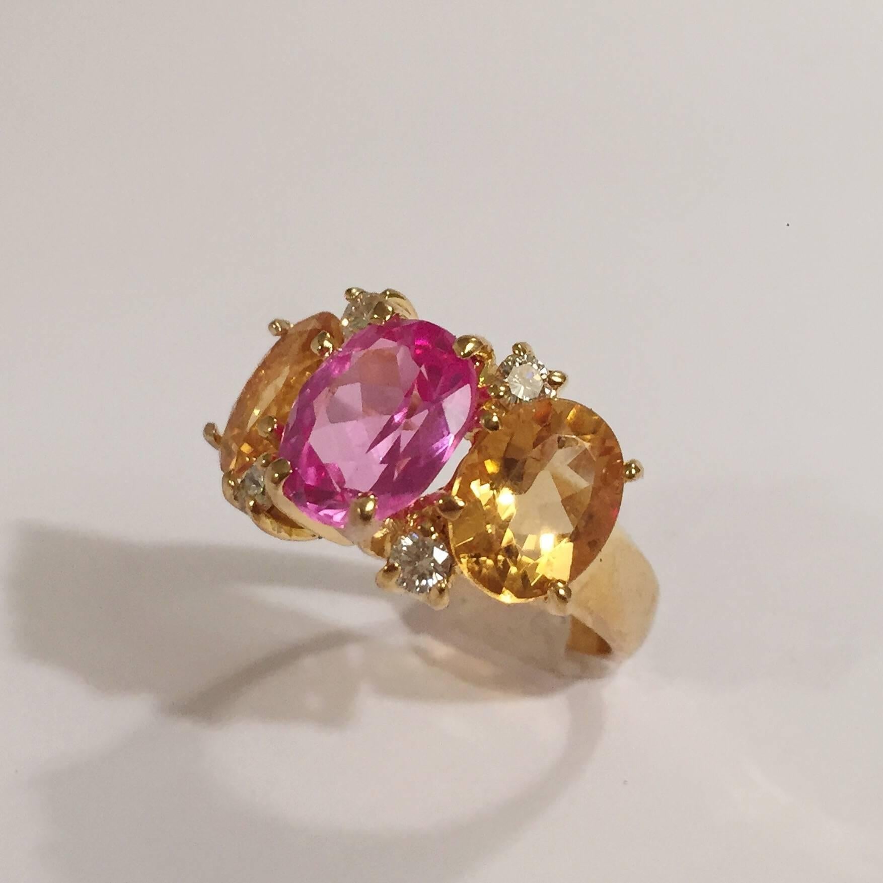 18kt White Gold Mini Three Stone GUM DROP™ Ring with Pink Topaz and Light Citrine and diamonds ~0.40cts  A big bang in a small package!  The ring measures 7/8" across the curved top and 3/4"from end stone to end stone.  

The ring can be