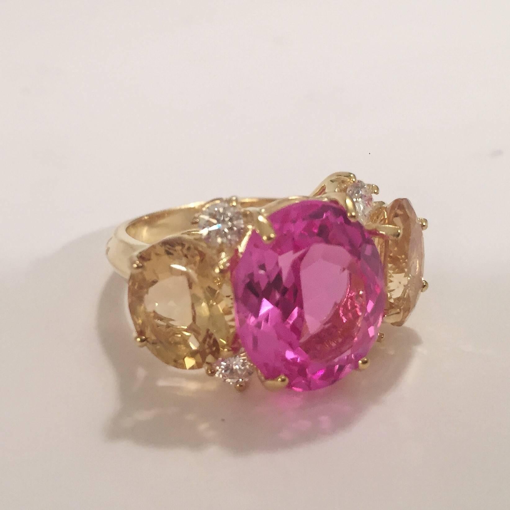 Large 18kt yellow gold GUM DROP™ ring with Pink Topaz (approximately 8 cts), Citrine (approximately 5 cts each), and 4 diamonds weighing approximately 0.48 cts.  
Specifications: Length: 15/16" Width: 5/8" 
 
The ring can be sized or