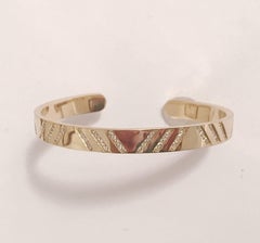 Bracelet manchette «lash » en or jaune et diamants