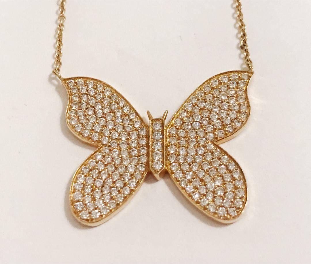 An Elegant Butterfly accented with brilliant diamonds!!!

18kt Yellow Gold Butterfly Necklace with White Pave Diamonds weighing approximately 1.25cts.

The necklace measures 1