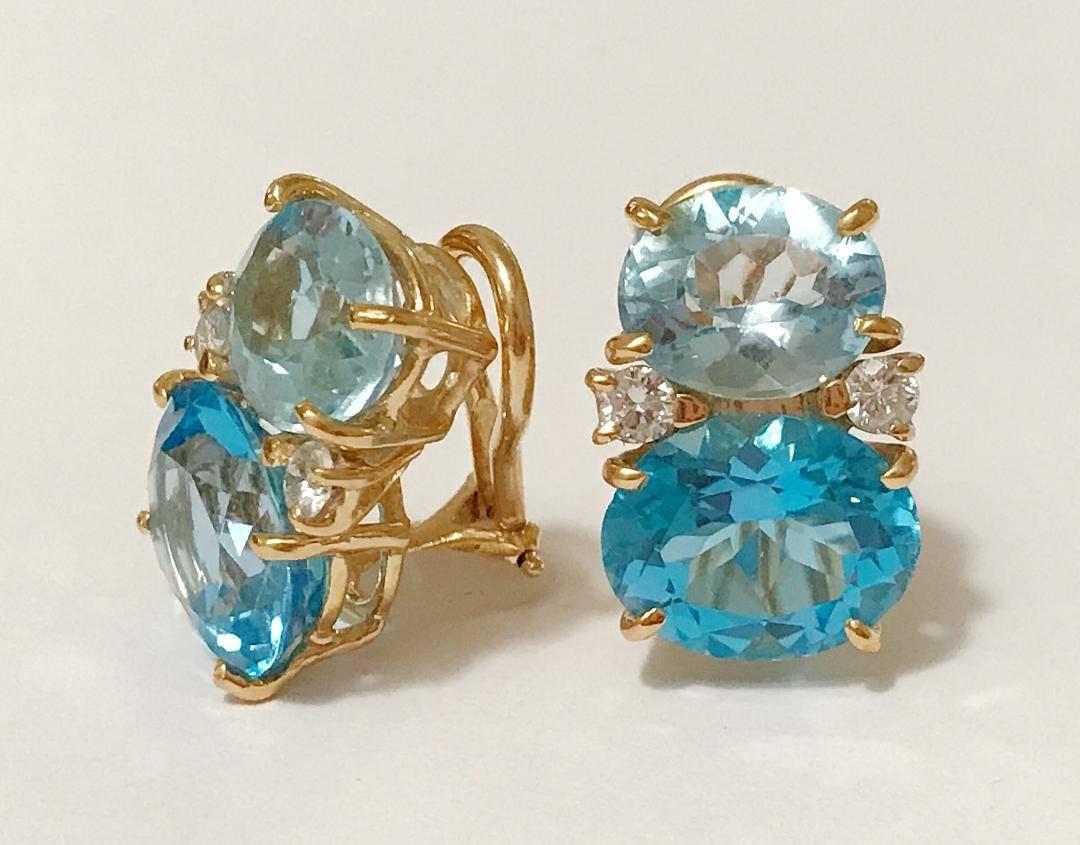 Medium 18kt yellow gold GUM DROP™ earrings with faceted Pale Blue  Topaz (approximately 2.5 cts each), faceted Dark Blue Topaz (approximately 5 cts each), and 4 diamonds weighing ~0.40 cts. 

Specifications: Height: 3/4