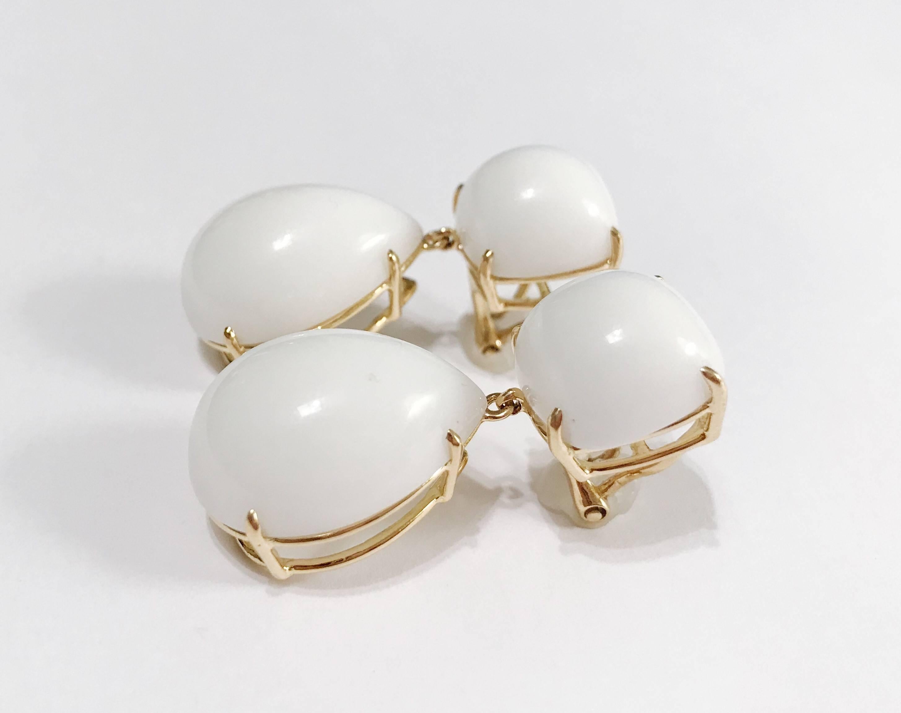 Elegant 18kt Yellow Gold Pear Drop Earring with White Jade is excellent statement piece. 

The meaning measures 1.5 inches tall and 1/2 inch wide.

This Pear Drop earring is available in any color stone combination in either Yellow Gold, Rose Gold,