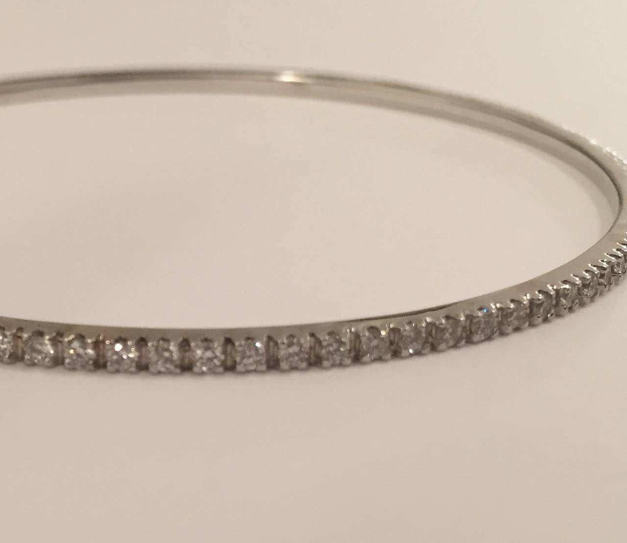 Delicate 18kt White Gold Diamond Bangle Bracelet with diamonds weighing 1.85 cts.  These look great when worn with multiples and stacked!