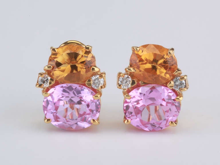 18kt Medium Yellow Gold GUM DROP™ earrings with citrine (approximately 2.5 cts each), pink topaz (approximately 5 cts each), and 4 diamonds weighing 0.40 cts.

Specifications: Height: 3/4
