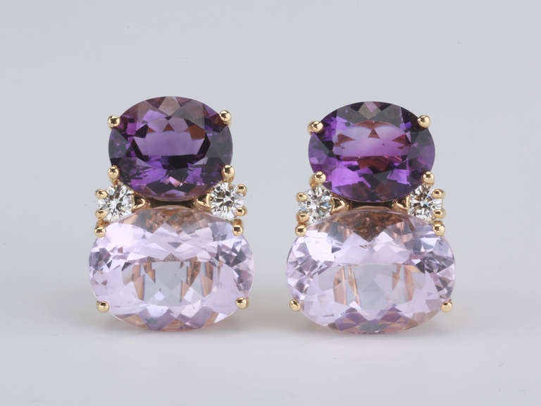 Large 18kt yellow gold GUM DROP™ earrings with dark amethyst (approximately 5 cts each), light amethyst (approximately 12 cts each), and 4 diamonds weighing 0.60 cts.

The earrings measure 1