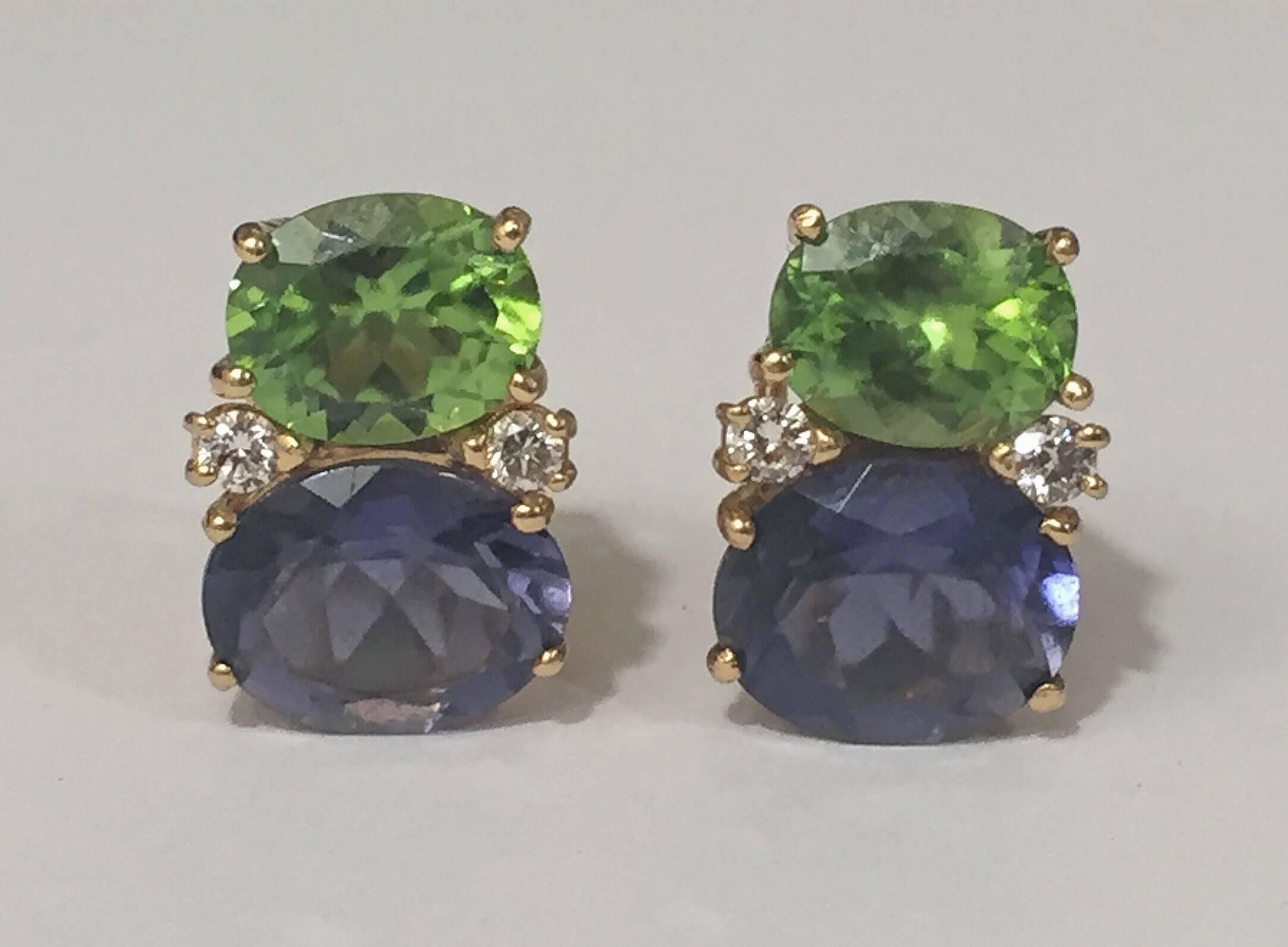Medium 18kt yellow gold GUM DROP™ earrings with faceted Peridot (approximately 2.5 cts each), faceted Iolite (approximately 5 cts each), and 4 diamonds weighing ~0.40 cts. 

Specifications: Height: 3/4