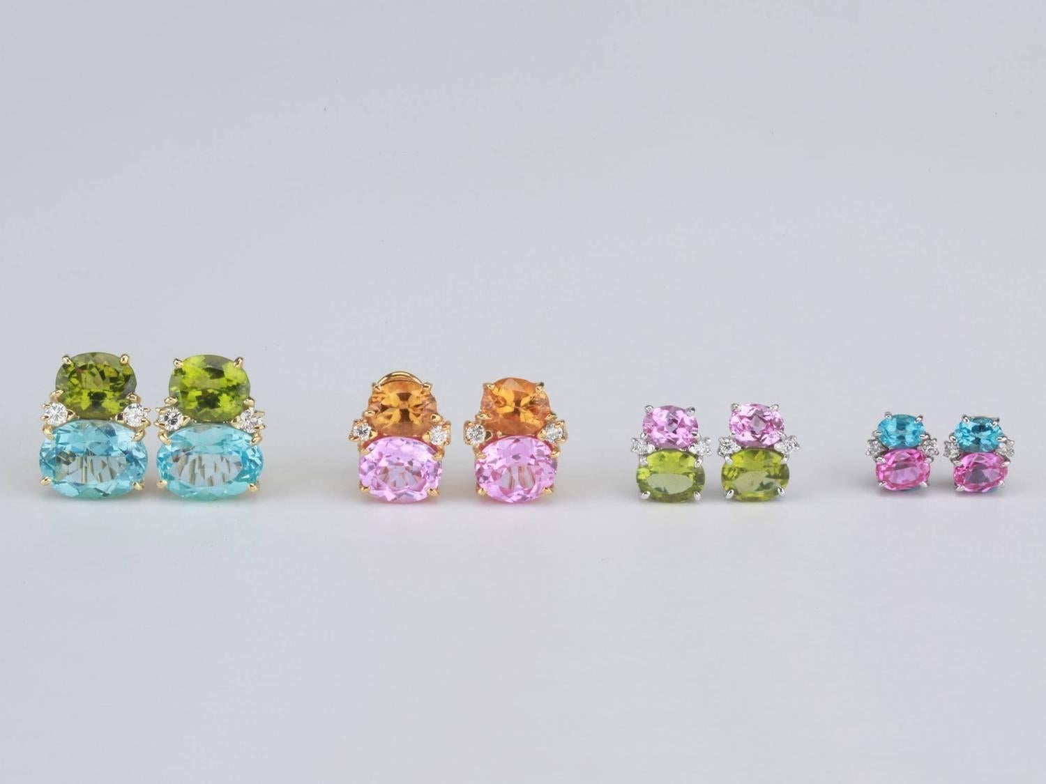 große GUM DROP™-Ohrringe aus 18 Karat Gelbgold mit facettiertem rosa Topas und Cabochon-Rauchtopas und Diamanten.

Der rosa Topas hat ein Gewicht von ca. 5 Karat und der Cabochon-Rauchtopas ein Gewicht von ca. 12 Karat, sowie 4 Diamanten mit einem