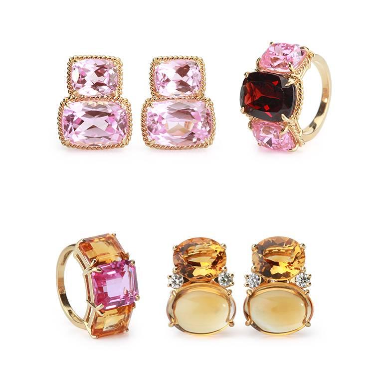 Elegant 18kt Yellow Three Stone Ring with Rope Twist Border with split shank detail. The ring features a center faceted cushion cut Garnet and two cushion cut Pink Topaz stones surrounded by twisted gold rope. The center Garnet stone measures 5/8