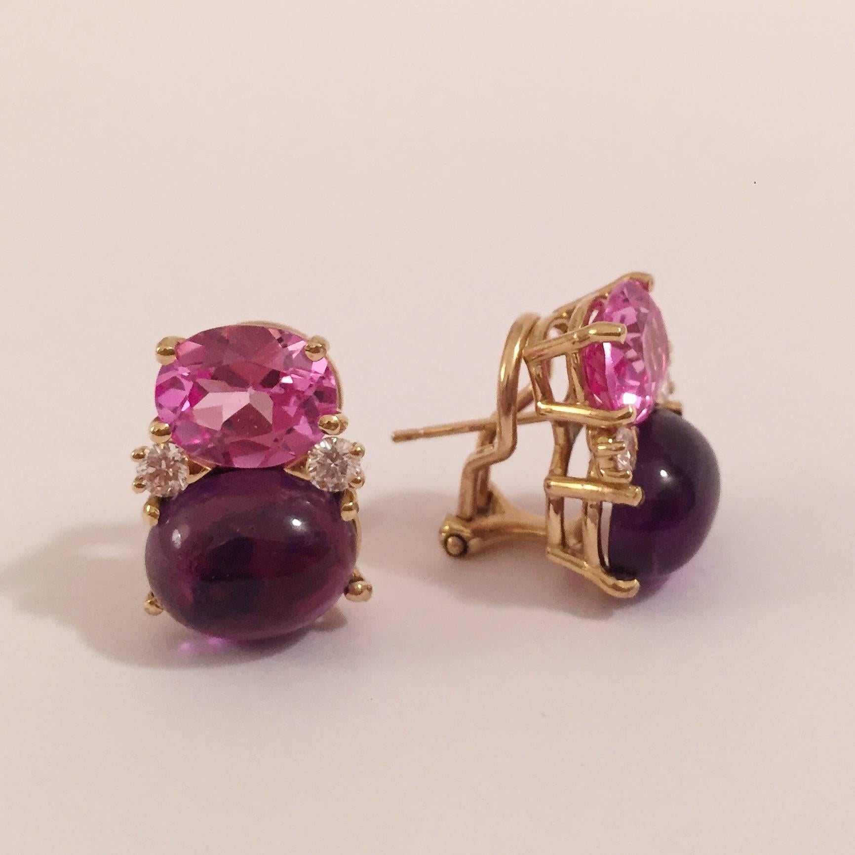 Medium 18kt yellow gold GUM DROP™ earrings with faceted Pink Topaz (approximately 2.5 cts each), cabochon Amethyst (approximately 5 cts each), and 4 diamonds weighing ~0.40 cts.   

Specifications: Height: 3/4