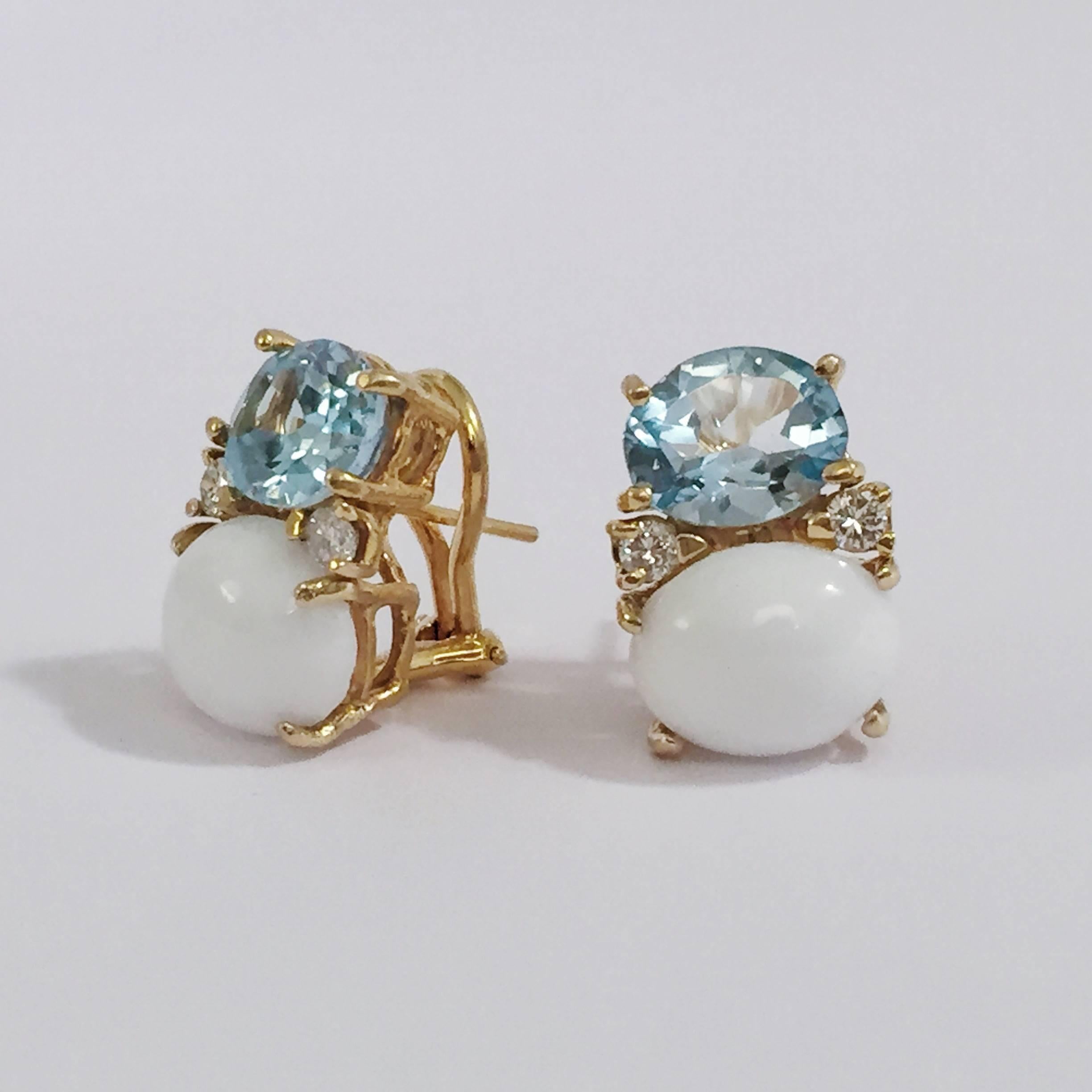 Medium 18kt yellow gold GUM DROP™ earrings with faceted Blue Topaz (approximately 2.5 cts each), cabochon white Jade (approximately 5 cts each), and 4 diamonds weighing ~0.40 cts.   

Specifications: Height: 3/4