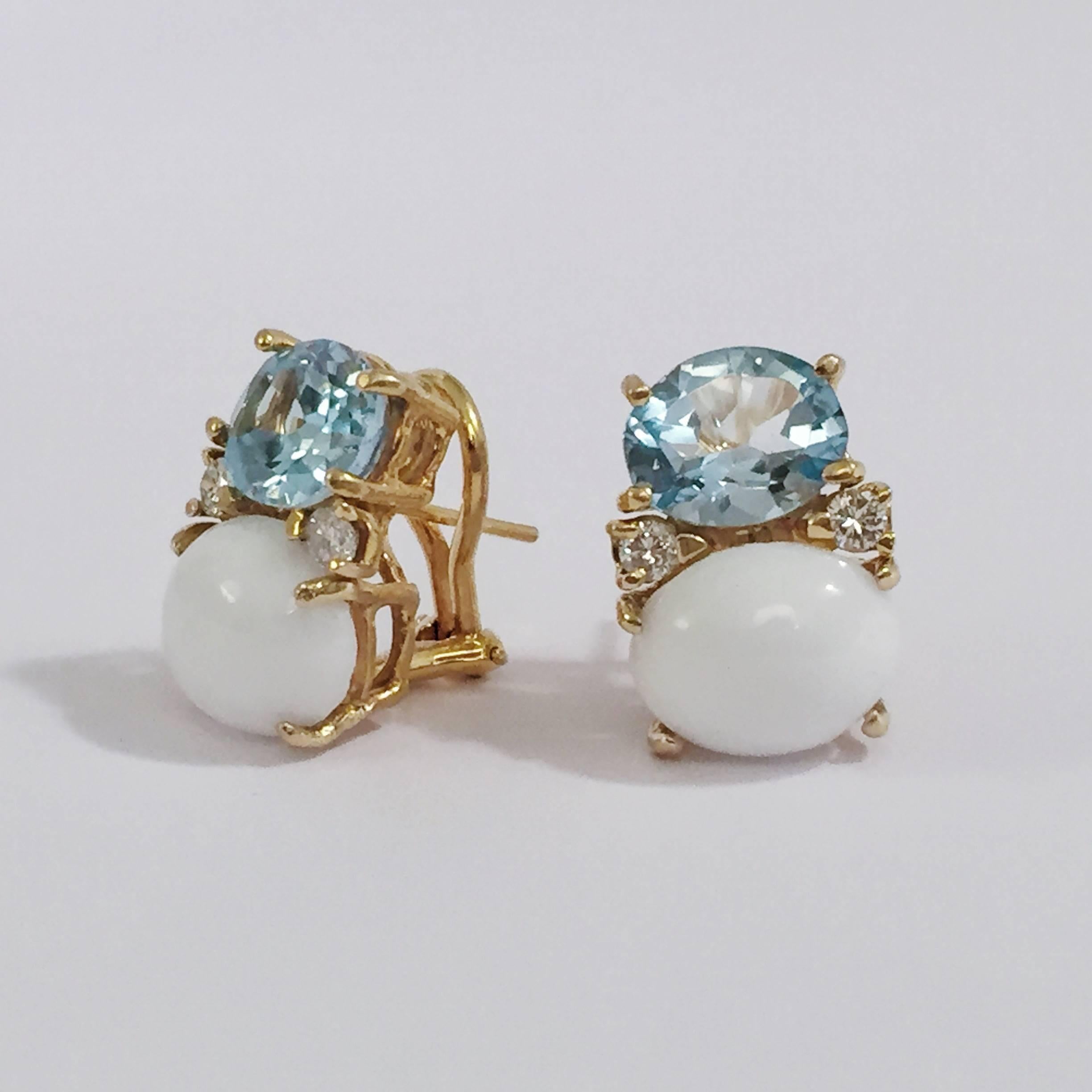 Christina Addison Fine Jewelry Medium 18kt yellow gold GUM DROP™ earrings with faceted Blue Topaz (approximately 2.5 cts each), cabochon white Jade (approximately 5 cts each), and 4 diamonds weighing ~0.40 cts.   

Specifications: Height: 3/4