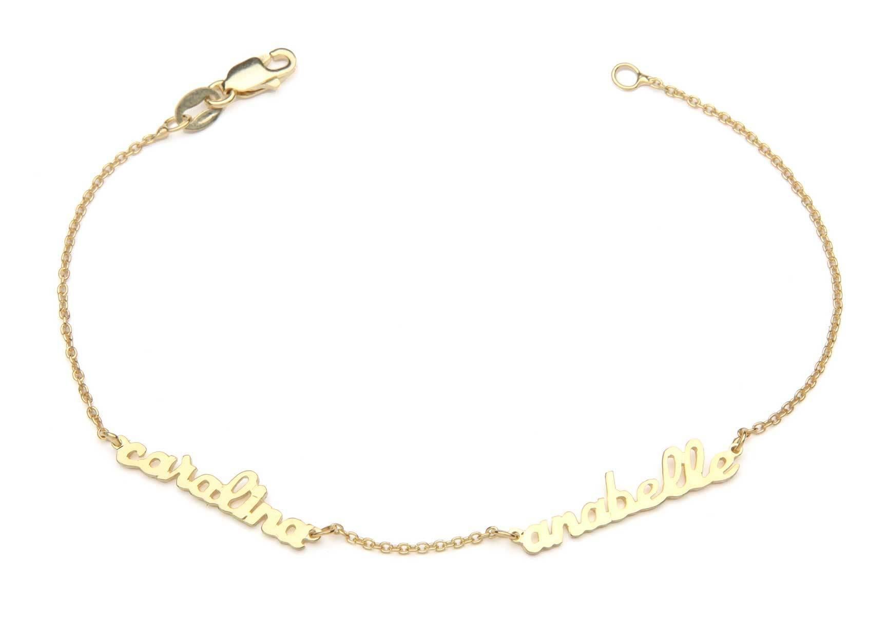 What could be more Special than a personalized gift!

The Personalized Mini Script Name Necklace Shown priced with two Names  -  in Gold Plate. 

It is available with as many names as you like in Silver, Gold Plated or 14kt Gold or Rose Gold.

The
