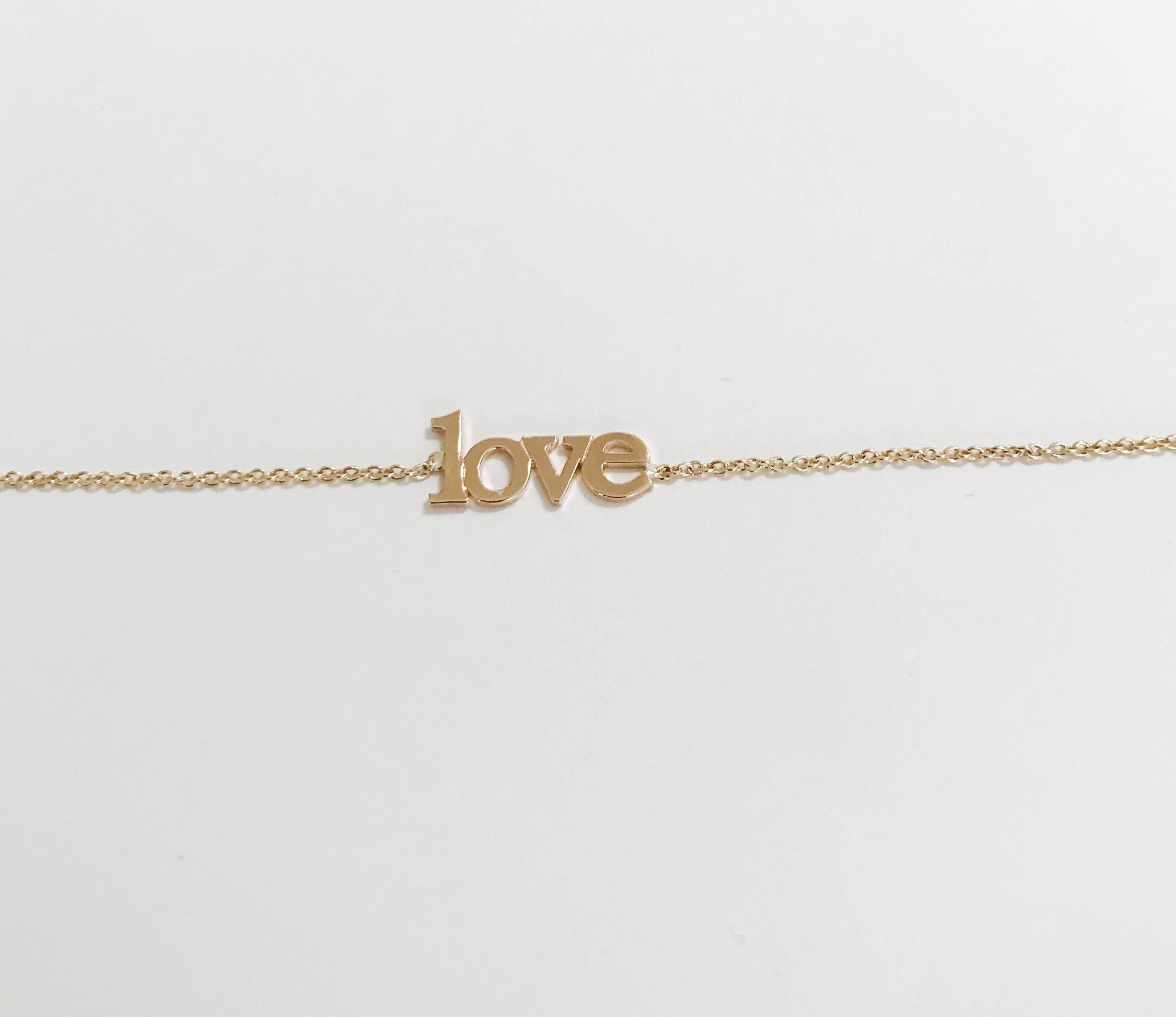 14kt Yellow Gold Small Love Bracelet measures 7.5 inches long. 

The 