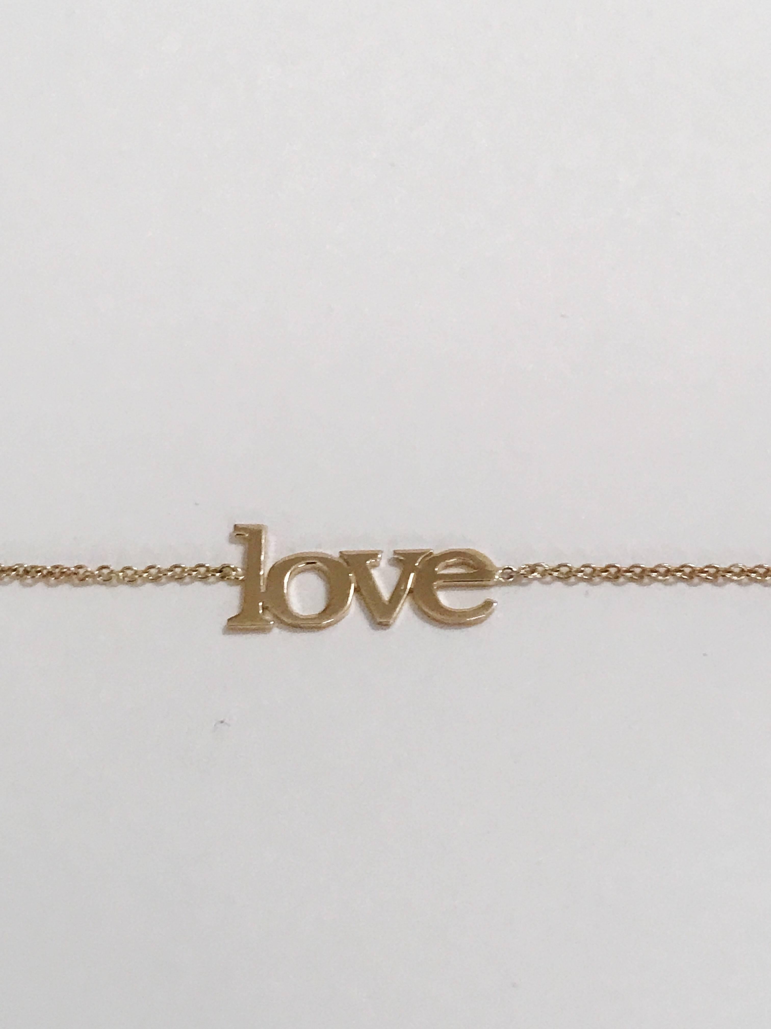 14kt Yellow Gold Large Love Bracelet measures 7.5 inches long. 

The 