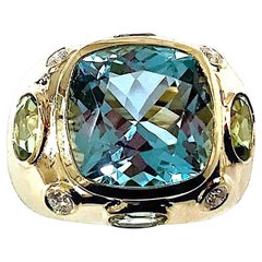 Anillo Bonheur, Topacio Azul Claro, Peridoto, Topacio Azul y Anillo Cúpula de Diamantes