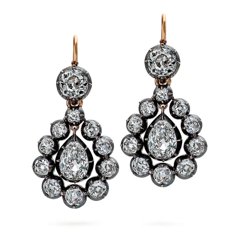 These paisley shaped drop earrings look so modern and stylish that they could have been designed yesterday.  With a total weight of approximately 8.10 carats of diamonds (D-H color), the English Victorian earrings, circa 1890, are mounted in