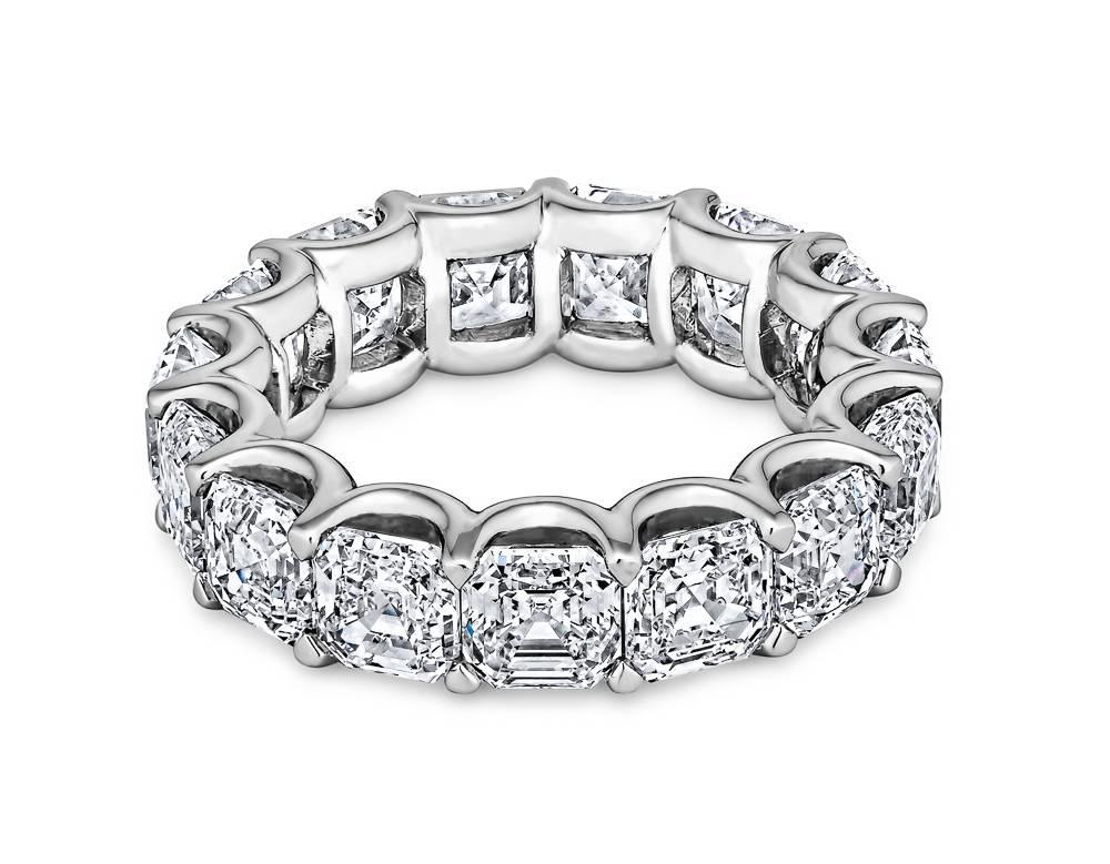 Extraordinary Asscher cut diamonds magically float in a handmade platinum setting creating an eternity band destined to become a treasured heirloom. Total diamond weight 8.05 carats. D-E color. VVS1-VS1 clarity. GIA certified. Size 6 1/4 US.