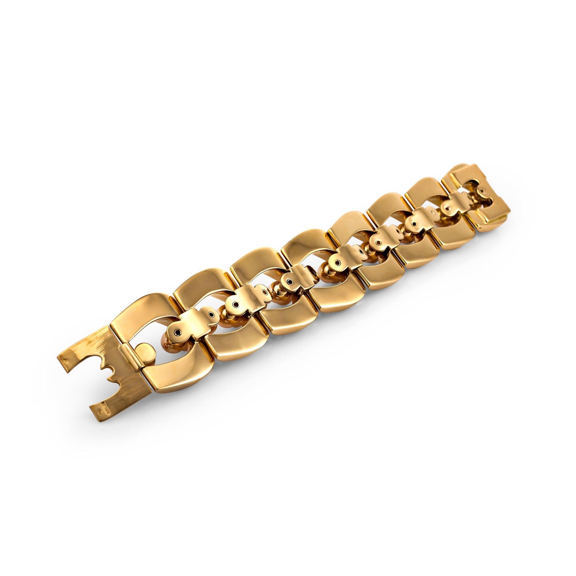 Designed in the 1940's by Bulgari and influenced by World War II, this one-of-a-kind handmade bracelet draws it's inspiration from wartime tank tracks and treads as well as the emergence of machine assembly line parts. Created in 18 karat yellow and