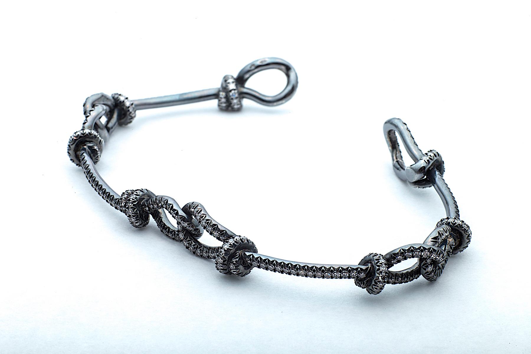 Contemporary Diamond Platinum Love Knot Bracelet