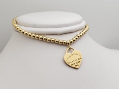 Verstellbares „Return to Tiffany“-Armband von Tiffany & Co. aus 18-karätigem Gelbgold mit Herzanhänger
