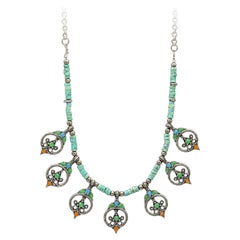 Collier imposant vintage de style tribal, en argent émaillé, avec franges et perles turquoise pendantes