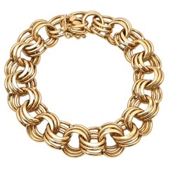 Heavy 14K Yellow Gold Interwoven Circular Link Charm Bracelet