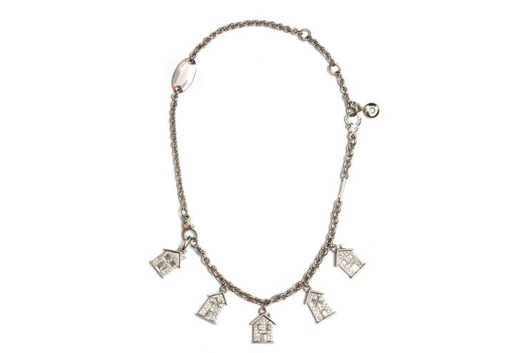 A Pomellato necklace, detachable to possibly form a bracelet, manufactured by the Italian house during the late 1970s, presenting platinum houses enriched by brilliant cut diamonds for a total approximate weight of 5cts, supported by an 18kt white