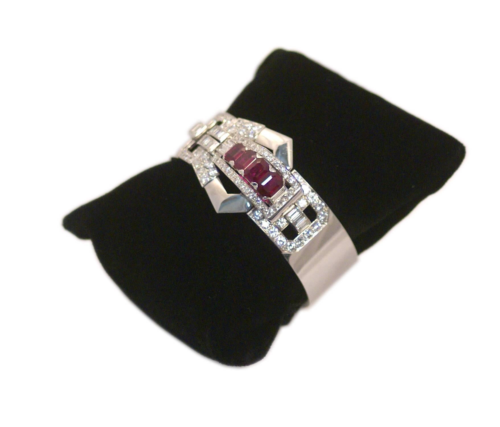 A platinum cuff bracelet of geometrical design, enhanced with natural Burmese rubies and mixed cut diamonds. Crica 1950.