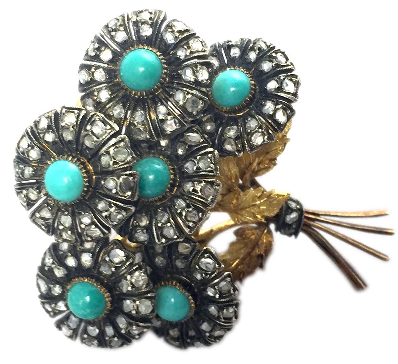 A gracious turquoise and diamond flower bouquet brooch by Buccellati, circa 1960.
