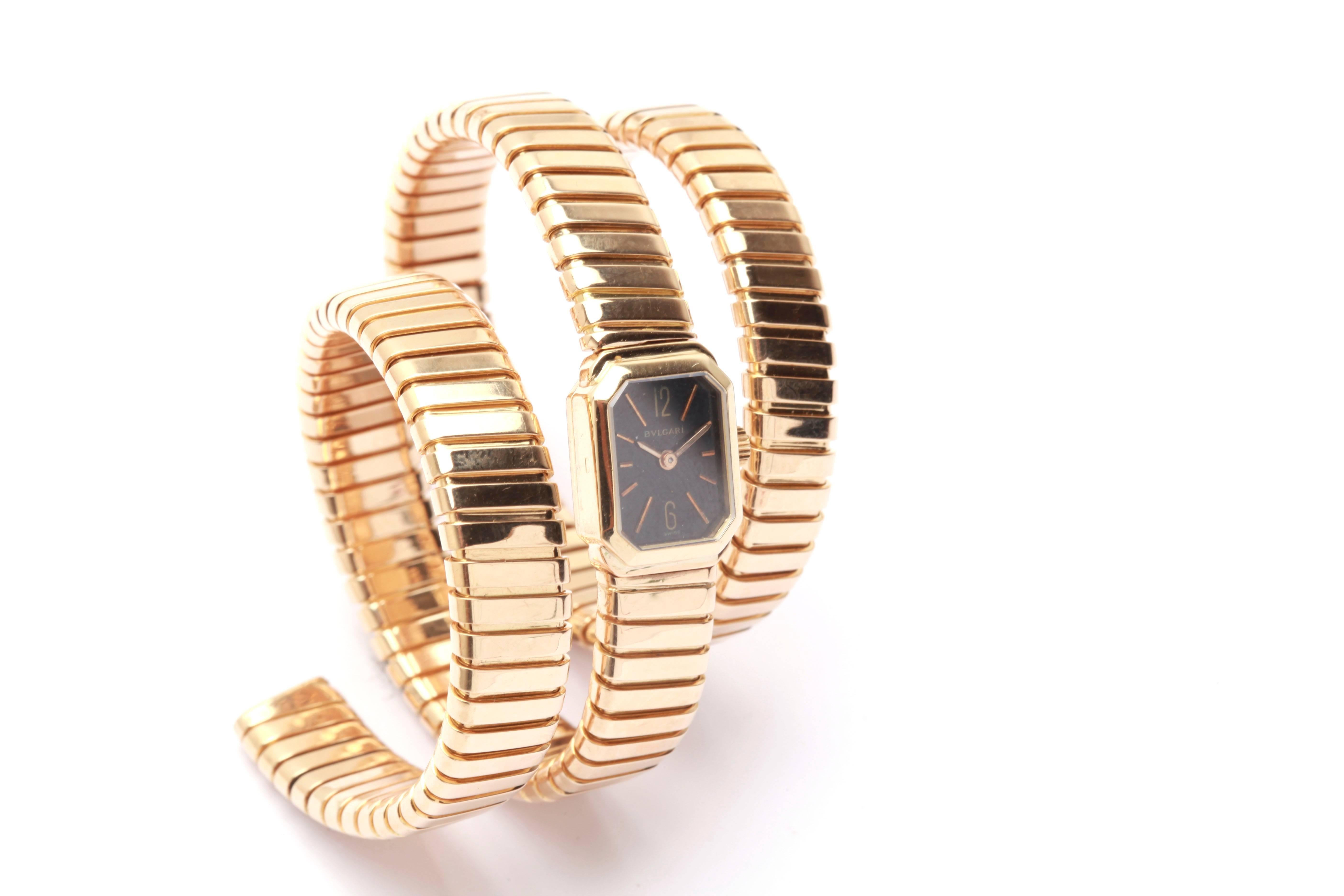 An unusual version of the Bulgari Tubogas Lady's Watch- Bracelet, with a centrally posed black dial. Made in Italy, circa 1968. 
