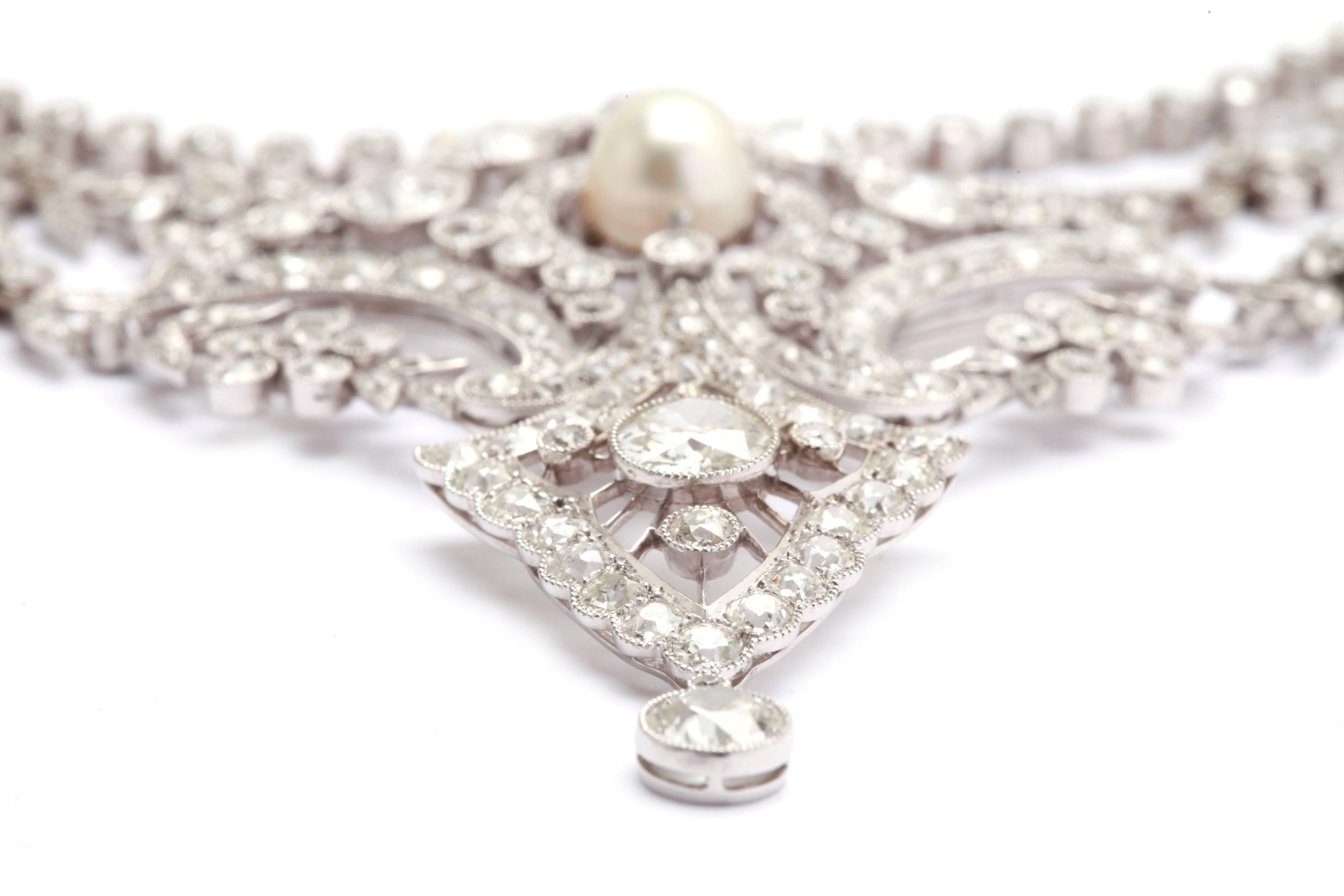 An extraordinary Belle Èpoque diamond and Natural Pearls collier by French Masters Caillot & Peck, circa 1890. Platinum mounting. 