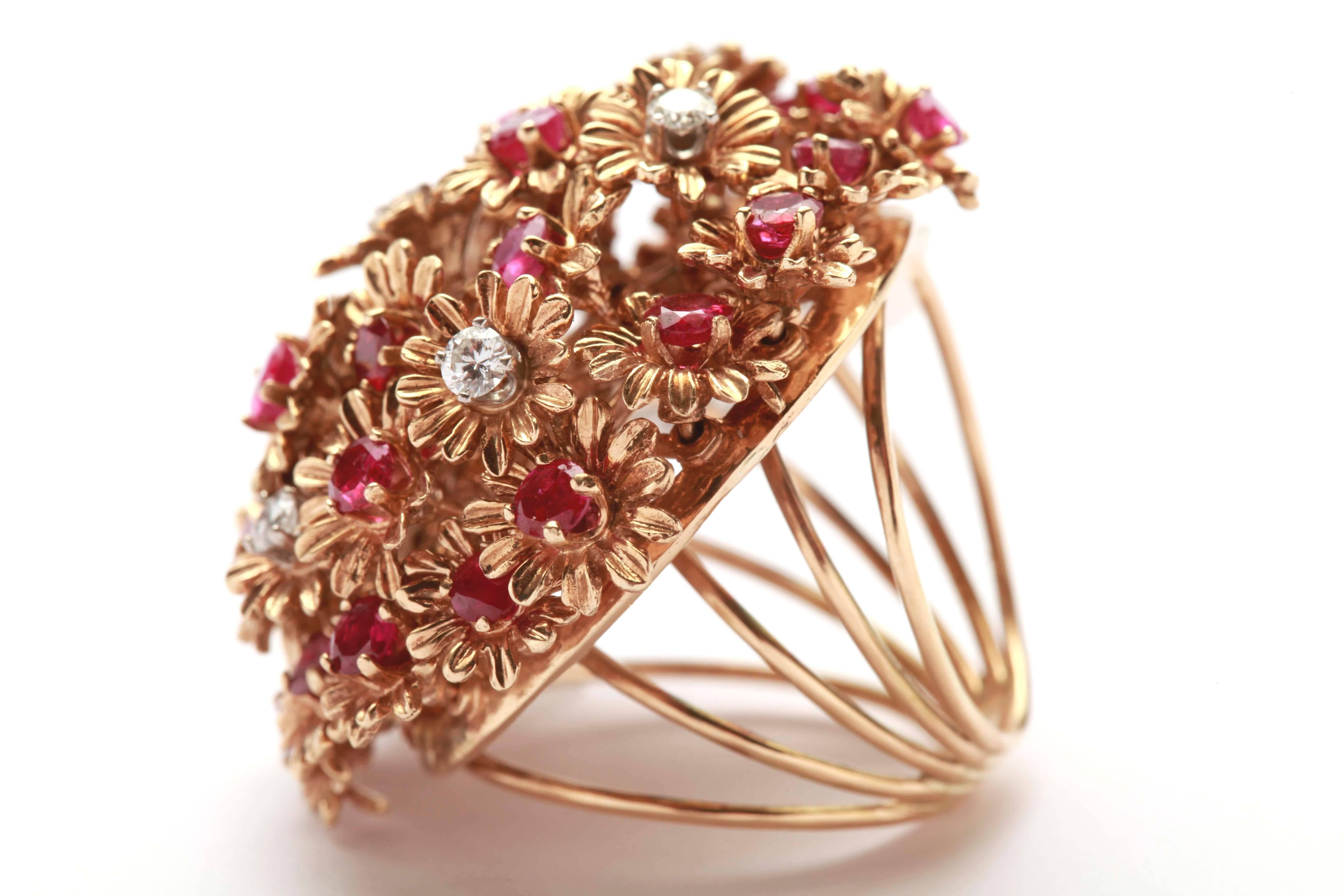 A large and fun cocktail ring, made with little margherita flowers, each embellished with either rubies or diamonds. Mounted on 14kt yellow gold. Made in the United States, circa 1960. 