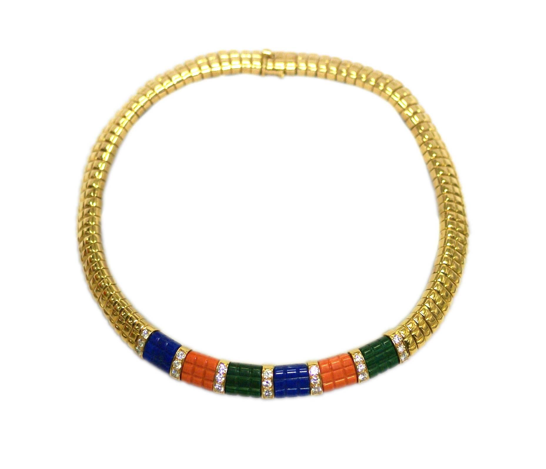A sophisticated set comprised of necklace, bracelet and ring; of geometrical design, presenting alternated lapis, coral and malachite rectangular elements, highlighted and divided my diamond pavè sections. Signed Van Cleef & Arpels, circa 1985.