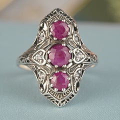 Anillo de filigrana de estilo vintage con rubí natural, topacio blanco y plata 925