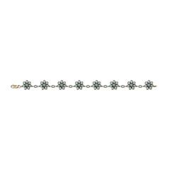 Bracciale a maglie con grappolo floreale in topazio blu, in oro giallo 9K