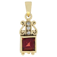 Square Garnet and Diamond Scrollwork Pendant in 9K Yellow Gold
