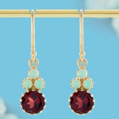 Ohrringe mit Granat- und Opal-Cluster in 9-karätigem Gelbgold