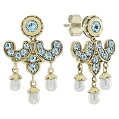 Blue Topaz and Pearl Border Drop Earrings in 9K Yellow Gold
