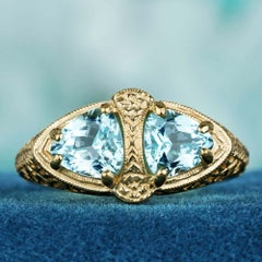 Blue Topaz Filigree Two Stone Ring in 9K Yellow Gold