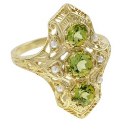 Peridot and Pearl Filigree Three Stone Shield Ring in 9K Yellow Gold