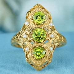 Peridot and Pearl Filigree Three Stone Shield Ring in 9K Yellow Gold