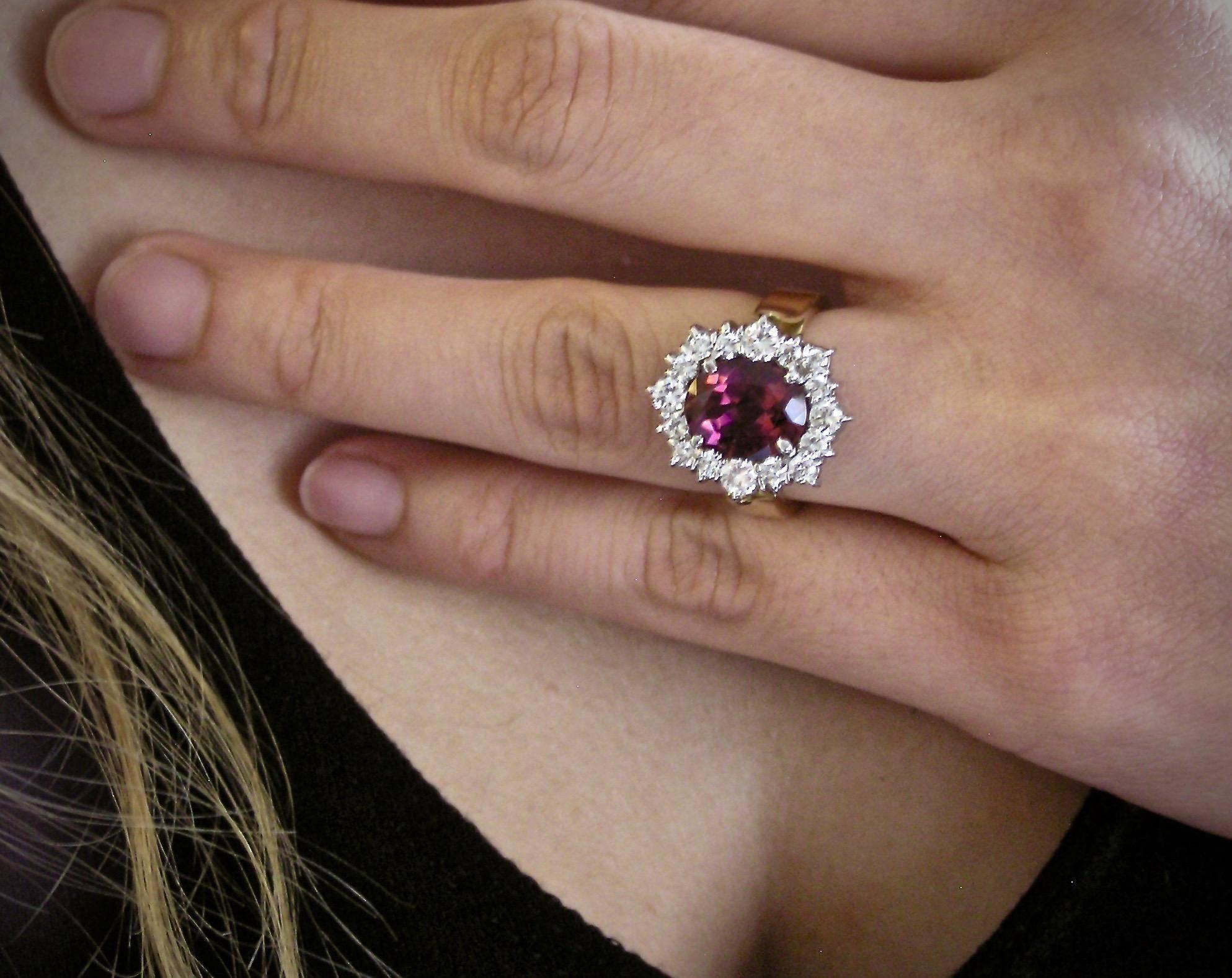Platinum ring, hand fabricated. The 3.60 carat oval-cut Rubellite Tourmaline of excellent quality, exhibiting a very saturated red-purple color with just a hint of peach. Think raspberry! It has very high intensity and sparkle! Rubellites such as