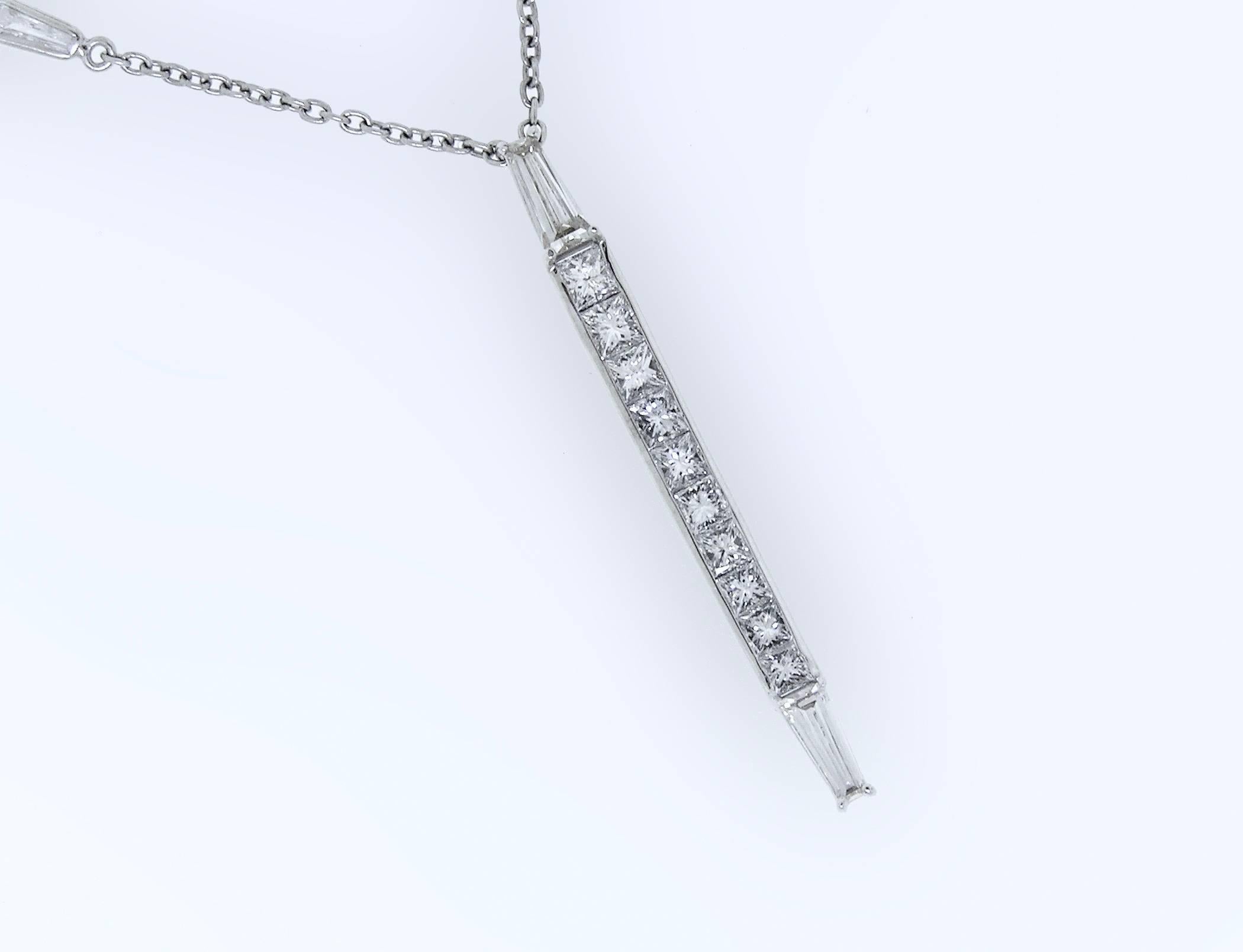 The Platinum piece is a wonderful modern contemporary design of Princess and Baguette cut Diamonds!  The pendant has graduated channel set Princess cut Diamonds accented on top and bottom with a Tapered Baguette cut Diamond.  The sixteen inch