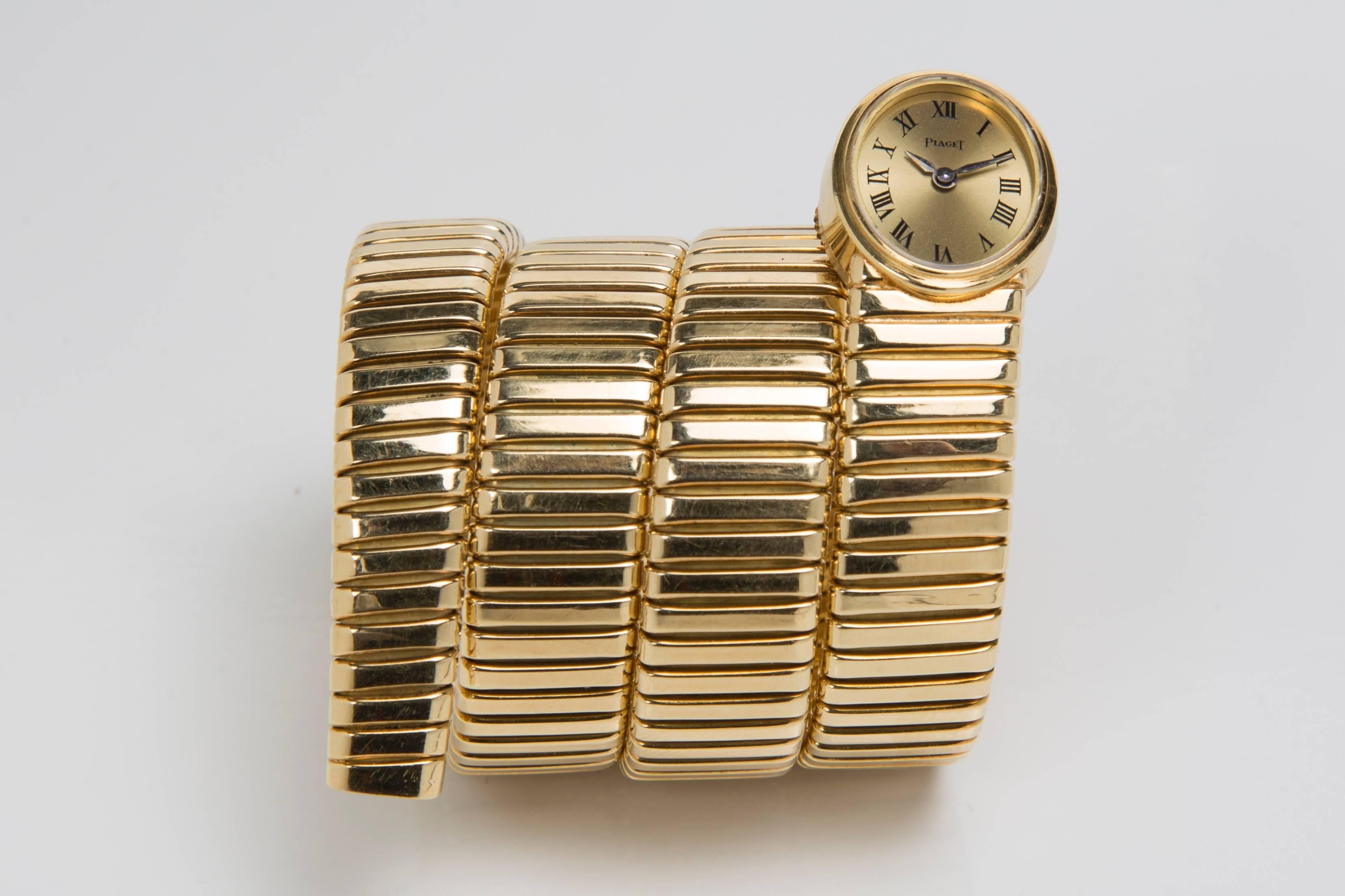 Piaget Serpent Watch
18K Yellow Gold 
Dial with Roman Numerals
Circa 1960