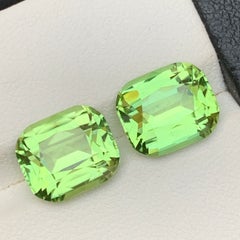 Vibrant Soft Green Natural Peridot 9.91 Carat Cushion Cut Loose Gemstones Pair
