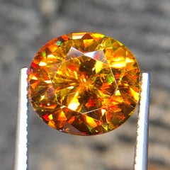 Natural Honey Golden Yellow Sphene (Titanite) 8.20 Carat Oval Cut Loose Gemstone