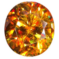 Natural Honey Golden Yellow Sphene (Titanite) 8.20 Carat Oval Cut Loose Gemstone
