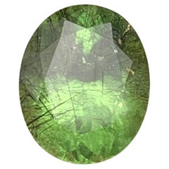 Light Olive Green Natural Peridot 4.29 Carat Oval Cut Loose Gemstone for Ring